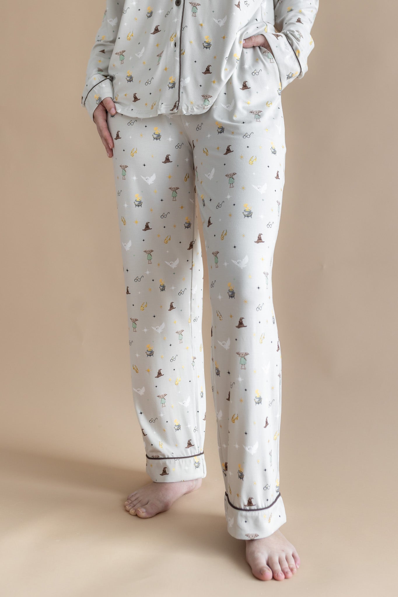 Close up of the bottoms from the Long-Sleeved Women's Pajama Set in Starry Icon while on a model 