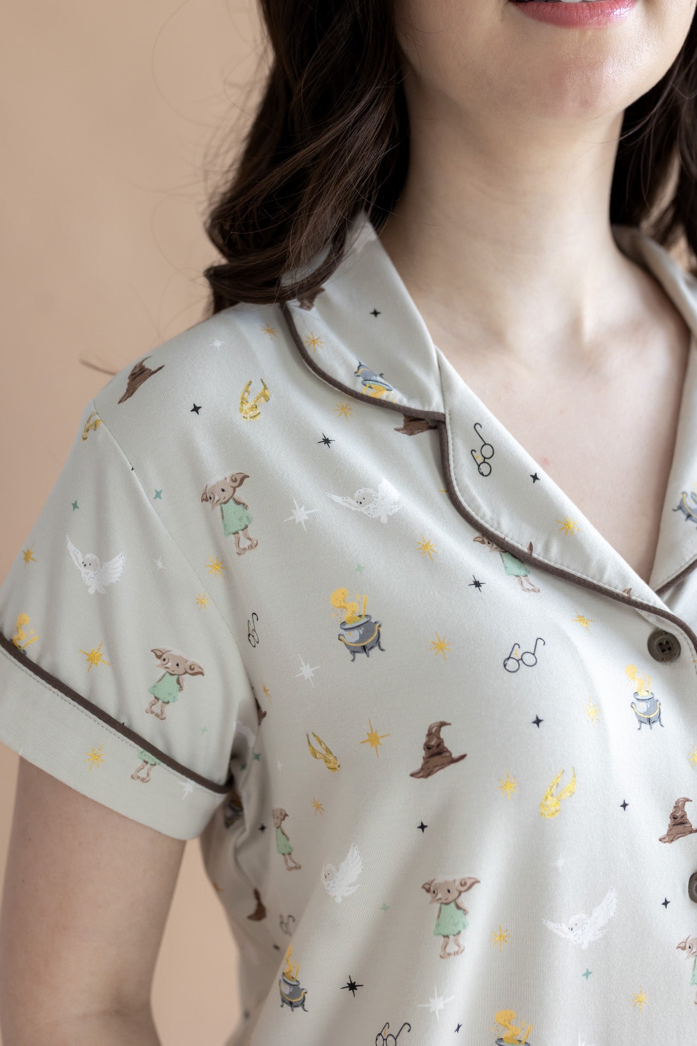Close up of the top from the Women's Short Sleeve Pajama Set in Starry Icon while on a model 
