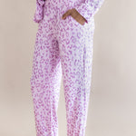Side view of Women's Long Sleeve Pajama with pockets in Thistle Leopard print on a beige background ---1605 3