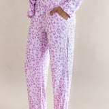 Side view of Women's Long Sleeve Pajama with pockets in Thistle Leopard print on a beige background ---1605 3