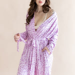 Model wearing Women's lounge robe in Thistle Leopard print on a beige background ::: Model is 5'7" wearing size XS/S ///
