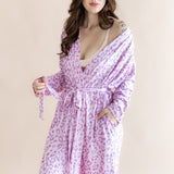 Model wearing Women's lounge robe in Thistle Leopard print on a beige background ::: Model is 5'7" wearing size XS/S ///