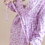 Women's lounge robe in Thistle Leopard print with a belt on a beige background