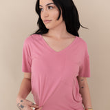 Woman modeling Women’s Relaxed Fit V-Neck in Apple Blossom