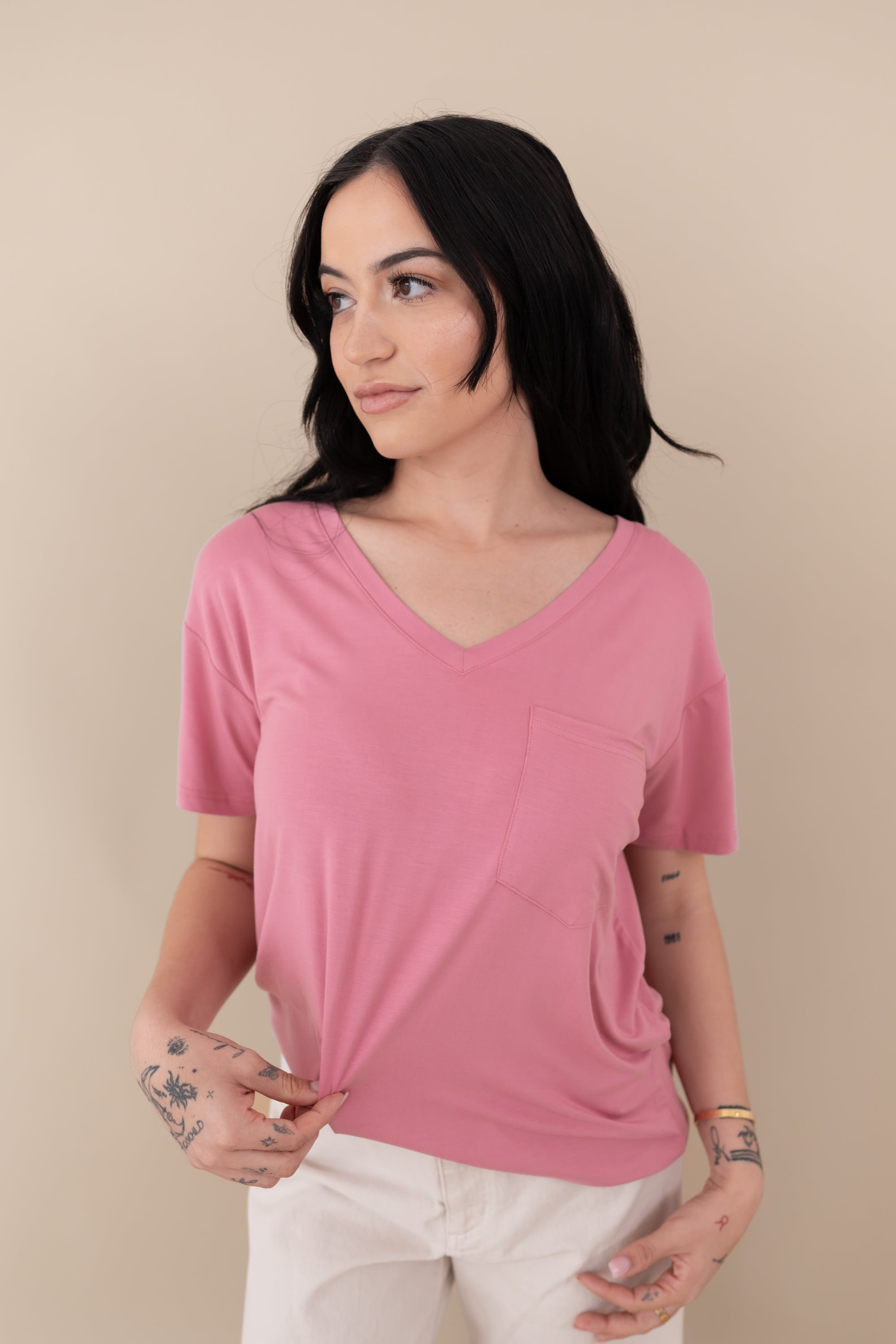 Woman modeling Women’s Relaxed Fit V-Neck in Apple Blossom