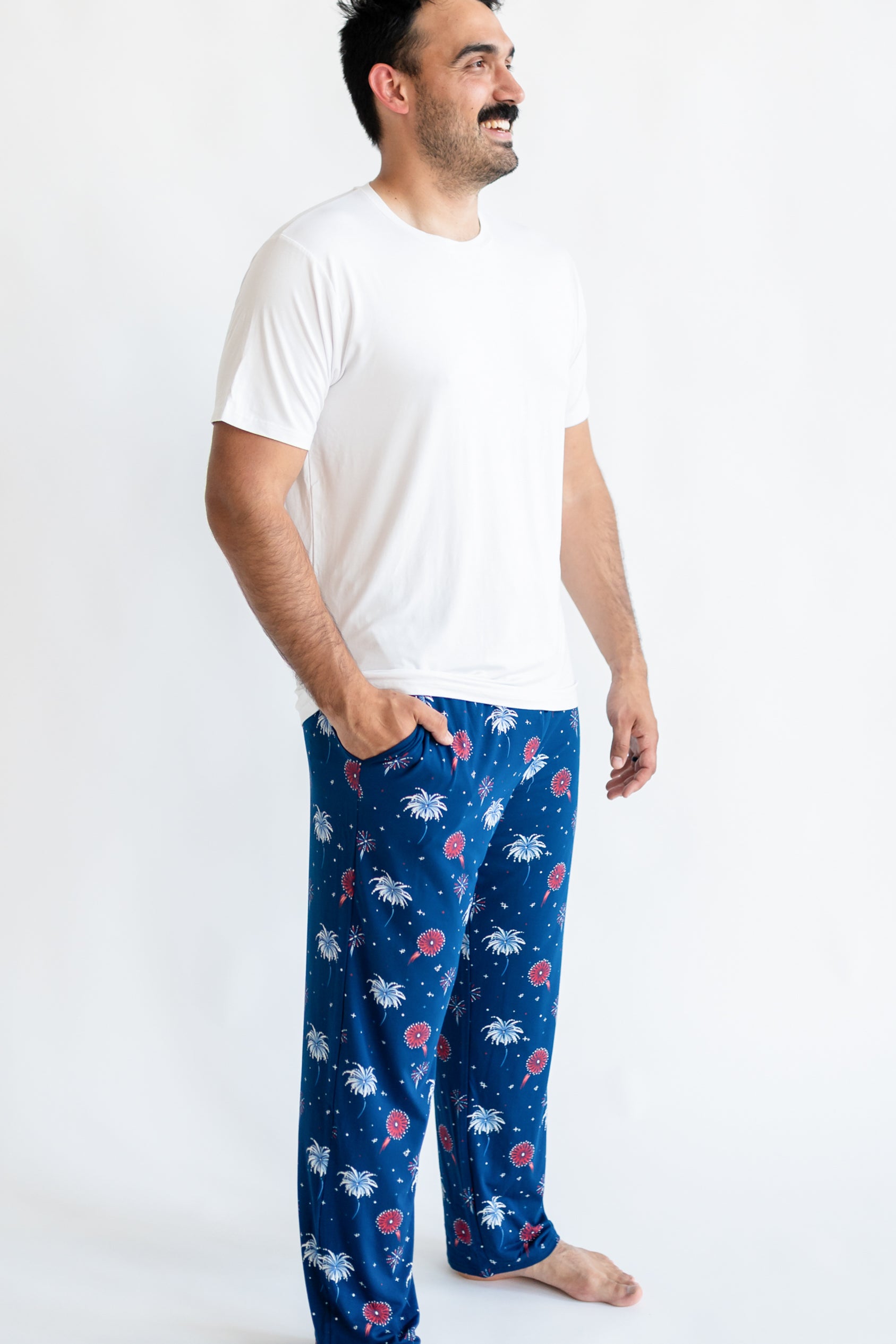 Man modeling Men's Lounge Pants in Celebration