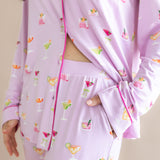 Close up of the unbuttoned top and waistband of the bottoms from the Long-Sleeved Women's Pajama Set in Cocktail