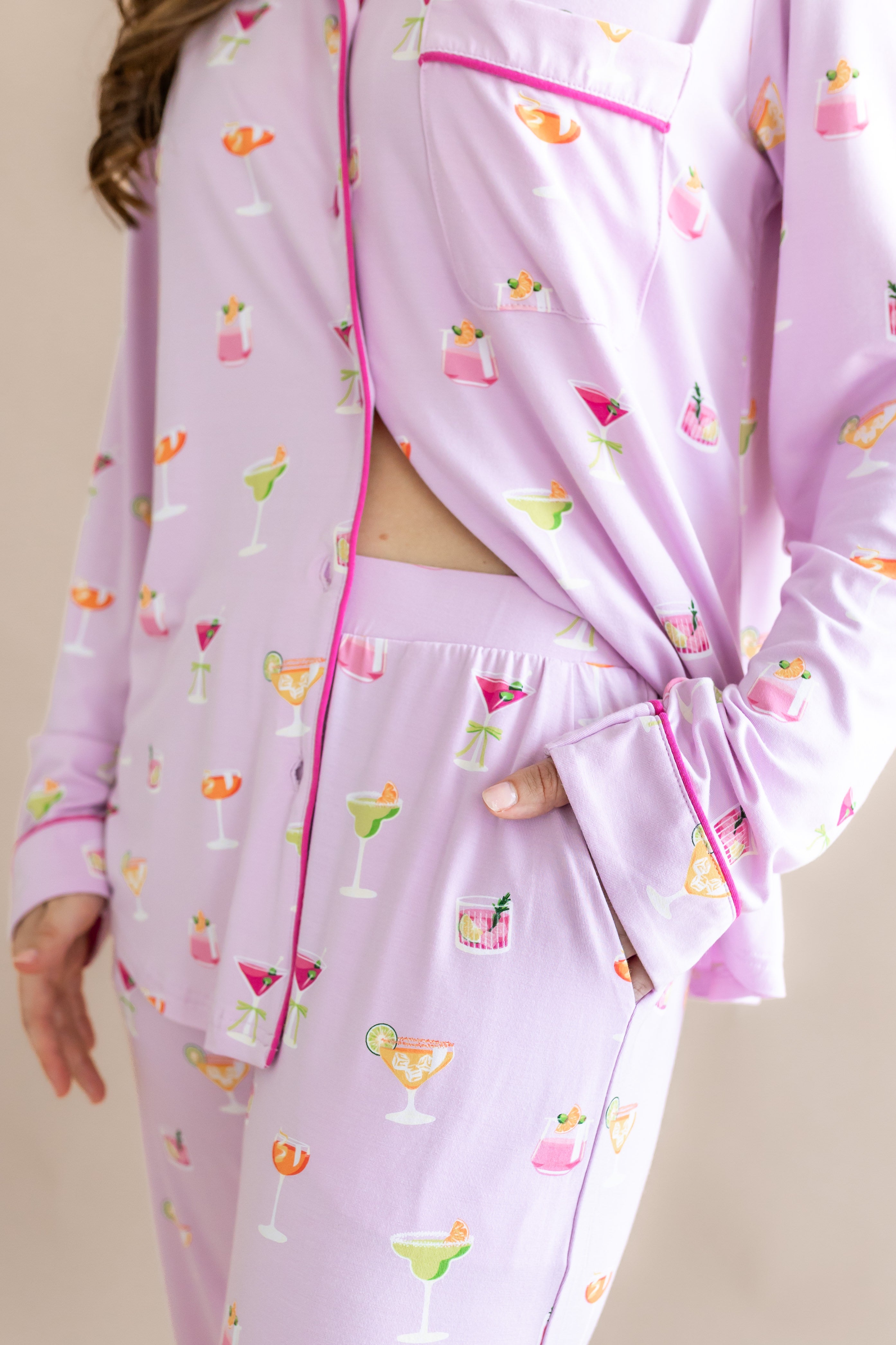 Close up of the unbuttoned top and waistband of the bottoms from the Long-Sleeved Women's Pajama Set in Cocktail