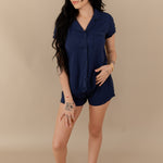 Woman modeling Women’s Short Sleeve Pajama Set in Navy with Navy Trim