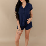Woman modeling Women’s Short Sleeve Pajama Set in Navy with Navy Trim