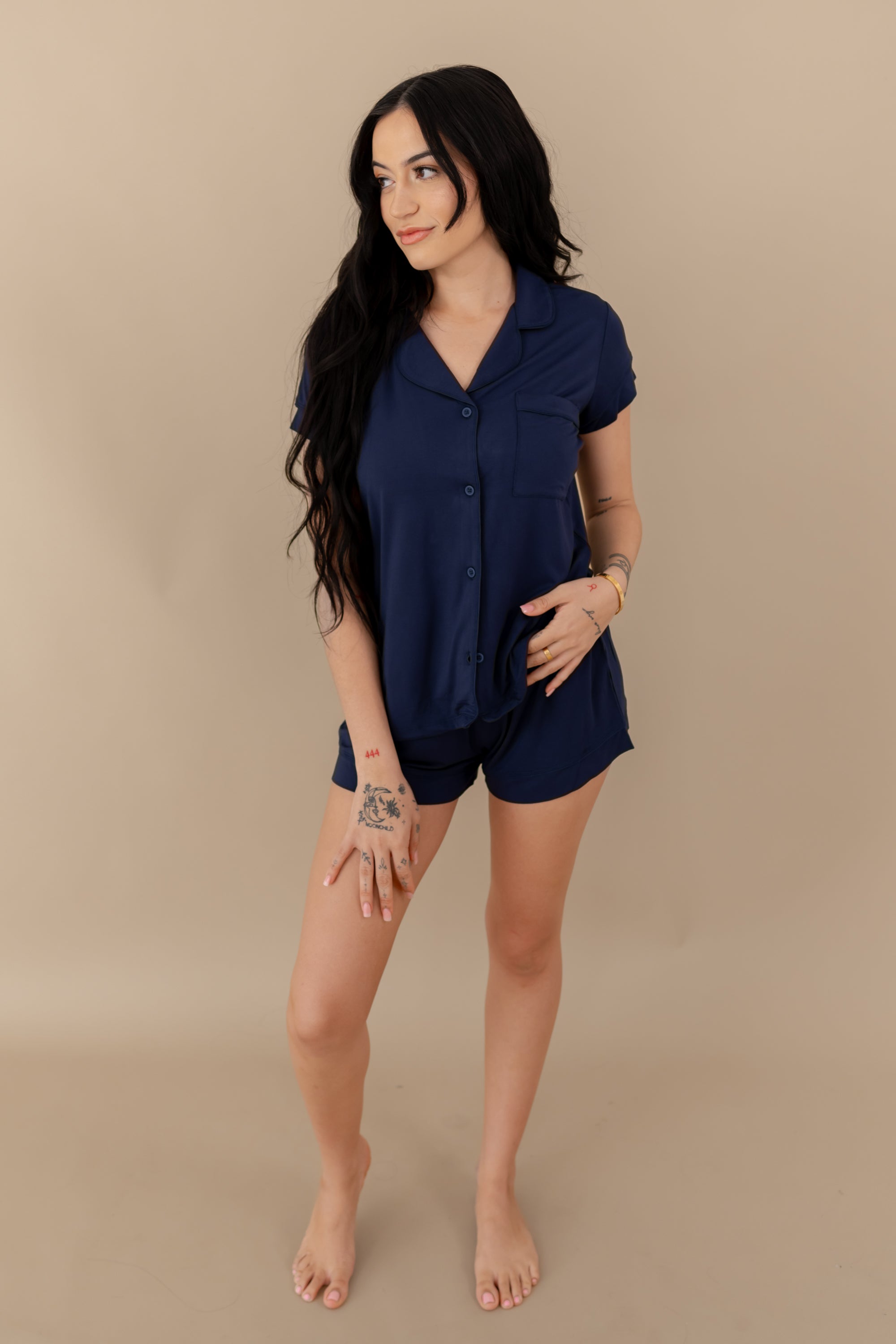 Woman modeling Women’s Short Sleeve Pajama Set in Navy with Navy Trim