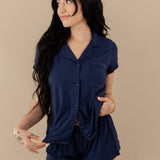 Woman modeling Women’s Short Sleeve Pajama Set in Navy with Navy Trim close up