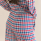 Back side of Long-Sleeved Women's Pajama Set in Patriotic Gingham print on a beige background