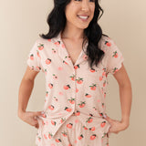 Woman modeling Women’s Short Sleeve Pajama Set in Peach