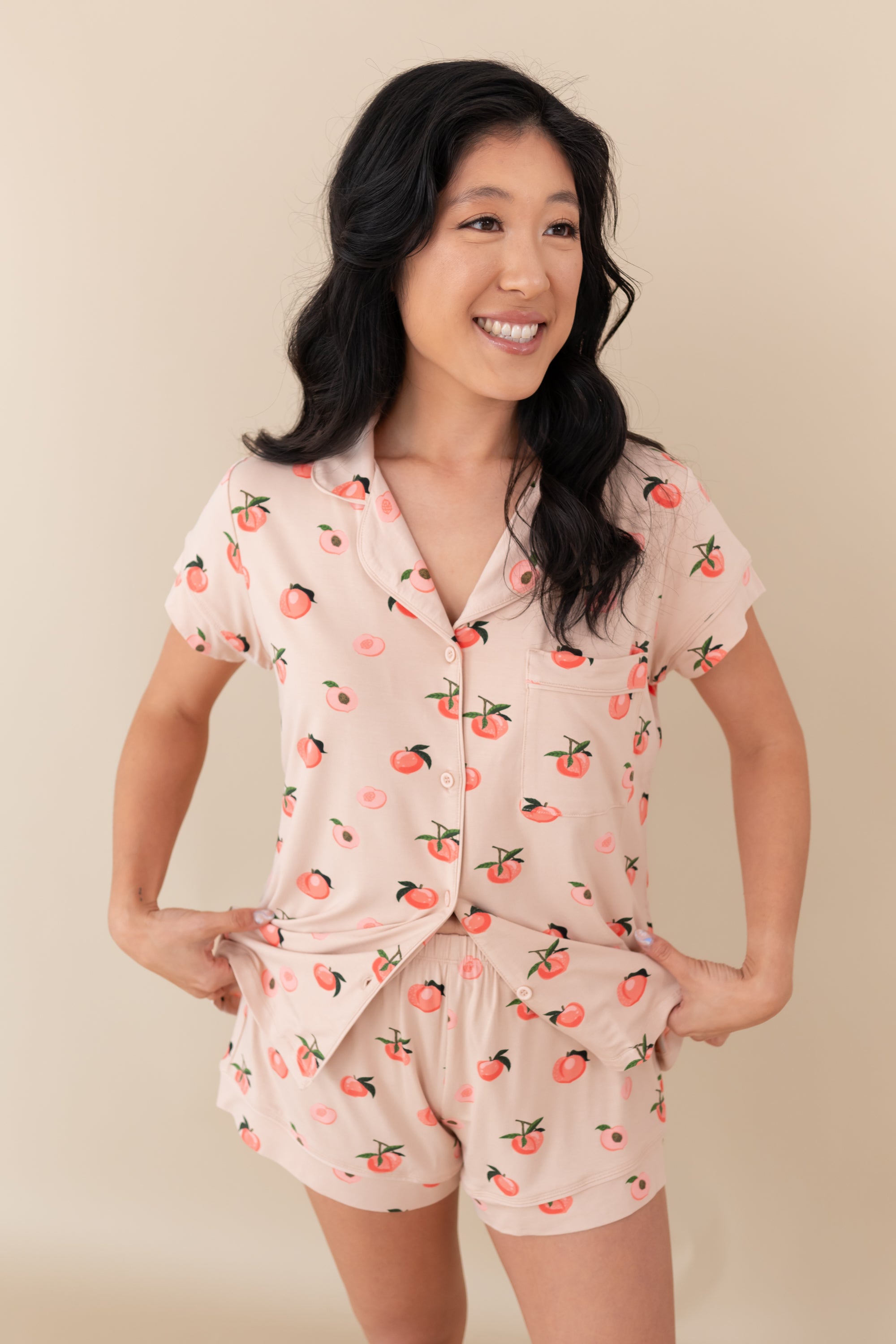 Woman modeling Women’s Short Sleeve Pajama Set in Peach