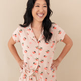 Woman modeling Women’s Short Sleeve Pajama Set in Peach with hands on hips