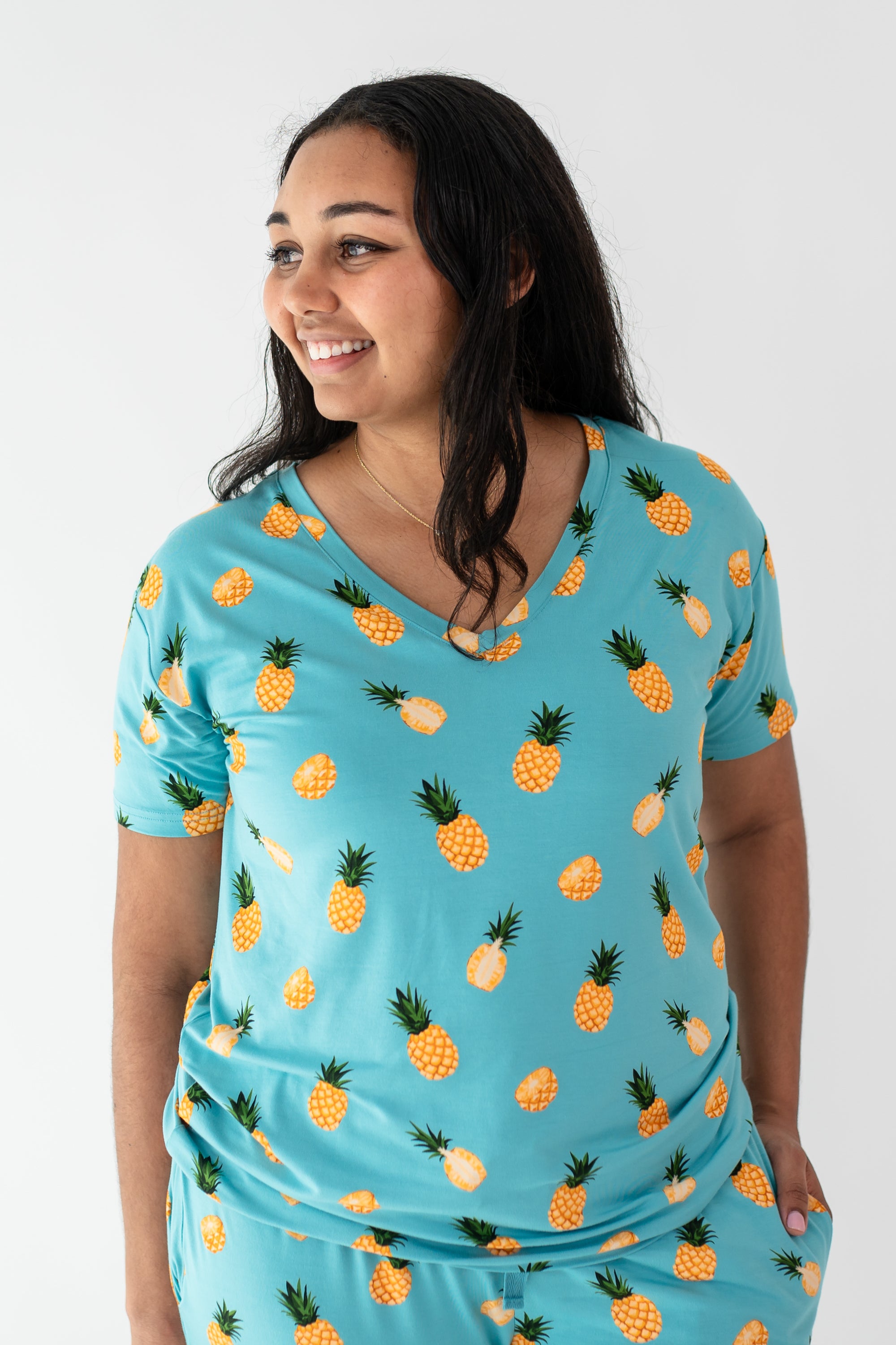 Woman modeling Women’s Relaxed Fit V-Neck in Pineapple
