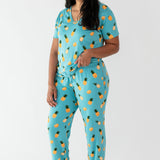 Woman modeling Women’s Relaxed Fit V-Neck in Pineapple and Lounge Pants in Pineapple