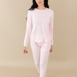 Woman modeling Women's Jogger Pajama Set in Sakura