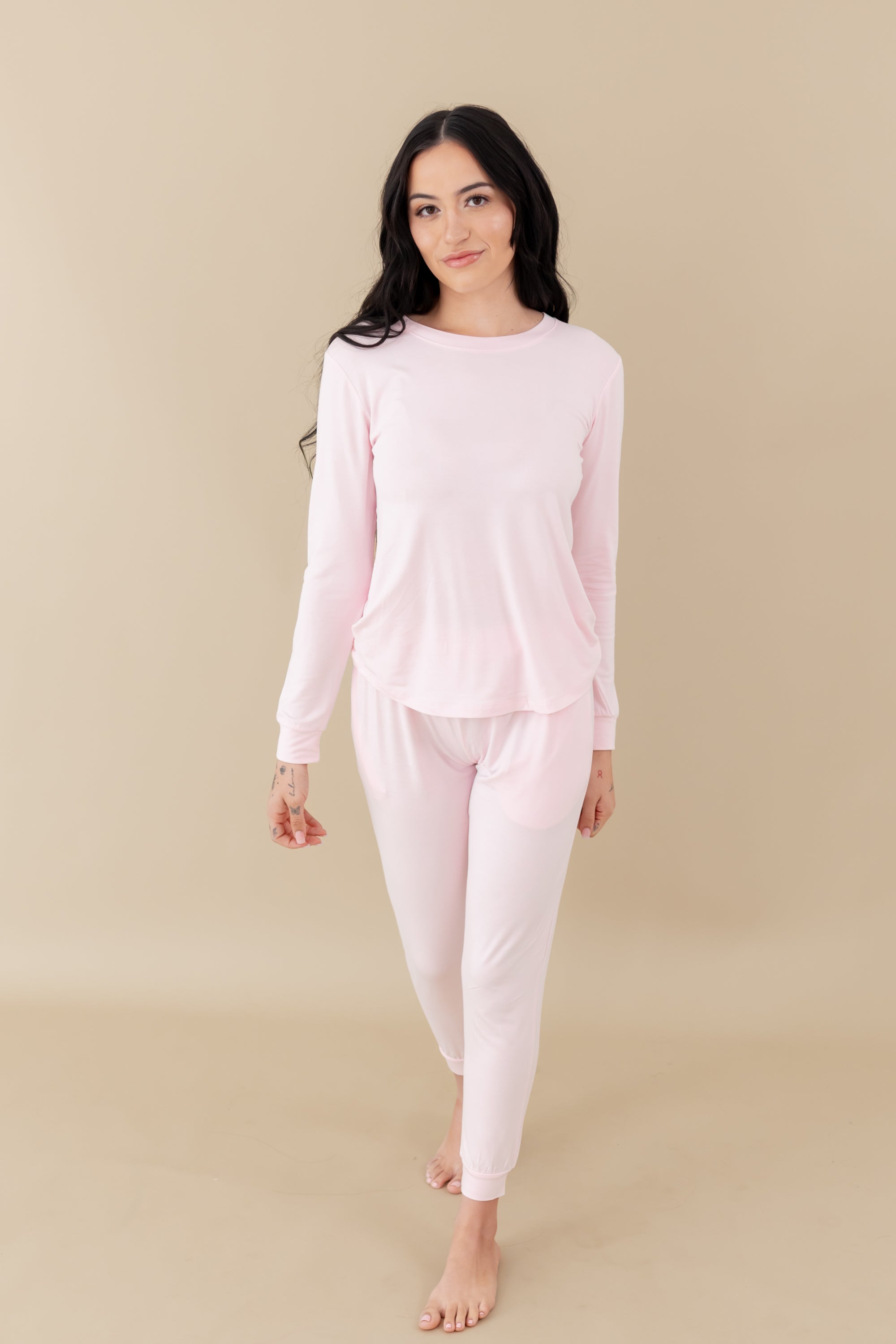 Woman modeling Women's Jogger Pajama Set in Sakura