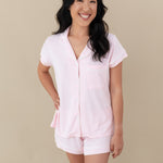 Woman modeling Women’s Short Sleeve Pajama Set in Sakura with Cloud Trim with hand on hip