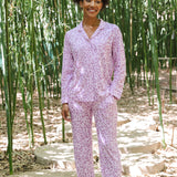 Model smiling in Women's Long Sleeve Pajama Set in Thistle Leopard print ::: Model is 5'9"" wearing size S ///