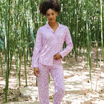 Model posing in Women's Long Sleeve Pajama Set in Thistle Leopard print