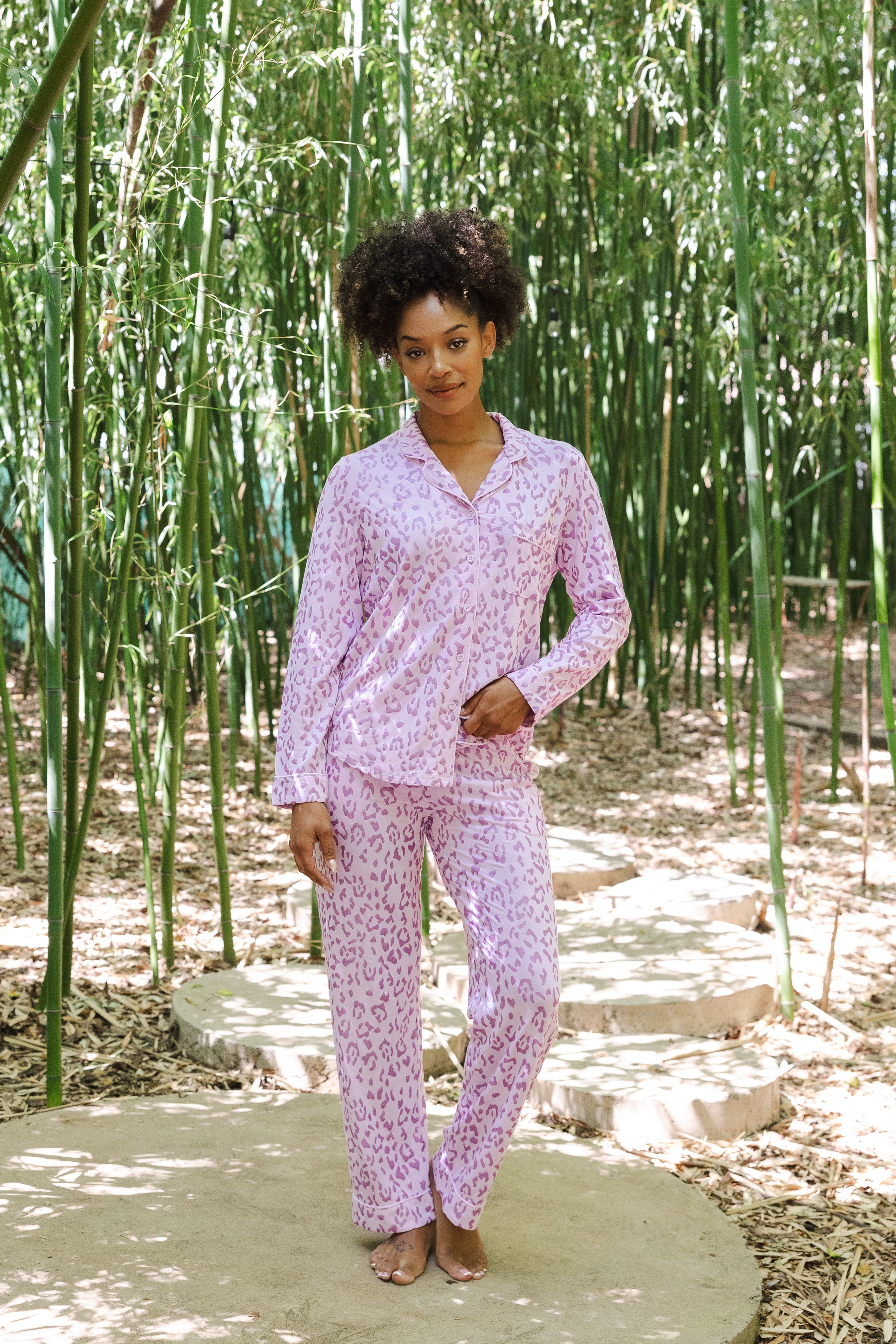 Model posing in Women's Long Sleeve Pajama Set in Thistle Leopard print