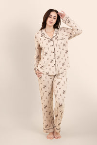 Female modeling the Long-Sleeved Women's Pajama Set in Classic Cowboy in front of a light neutral background ::: Model is 5'7" wearing size M ///