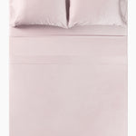 Overhead photo of the Bamboo Sateen Sheet Set in Rose Quartz on a bed