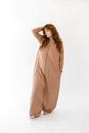 Model wearing the Adult Sleep Bag Walker in Latte