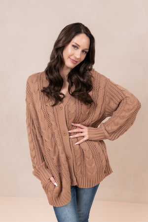 Woman modeling the Chunky Cable Knit Cardigan in Latte ::: Model is 5'9" wearing size S ///