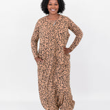 Woman modeling the Kyte Adult Sleep Bag Walker in Latte Leopard
