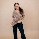 Model wearing the Women's V Neck Tee in Latte Leopard