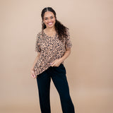 Model wearing the Women's V Neck Tee in Latte Leopard