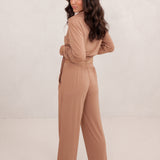 The back of the Long-Sleeved Women's Pajama Set in Latte with Latte Trim shown on a female model