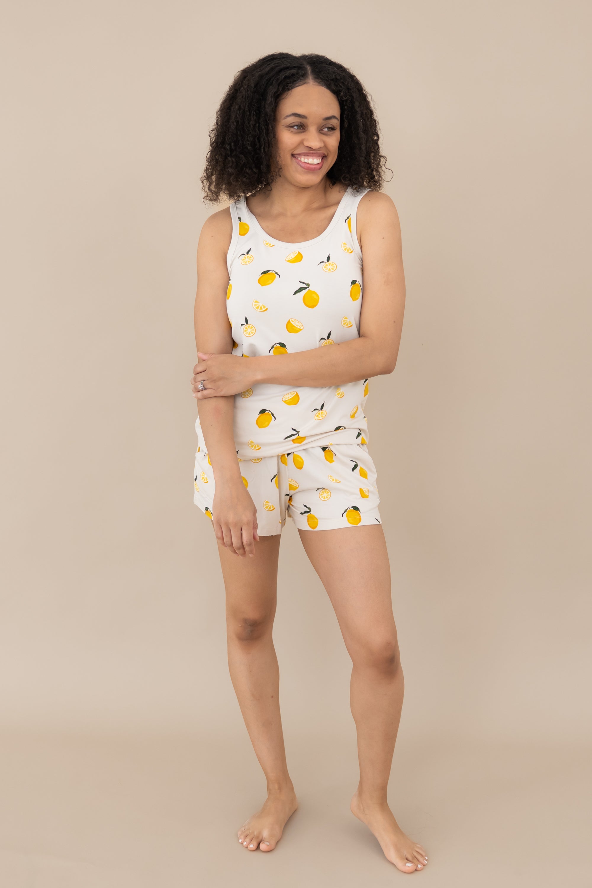 Female modeling the Women’s Tank Set in Lemon
