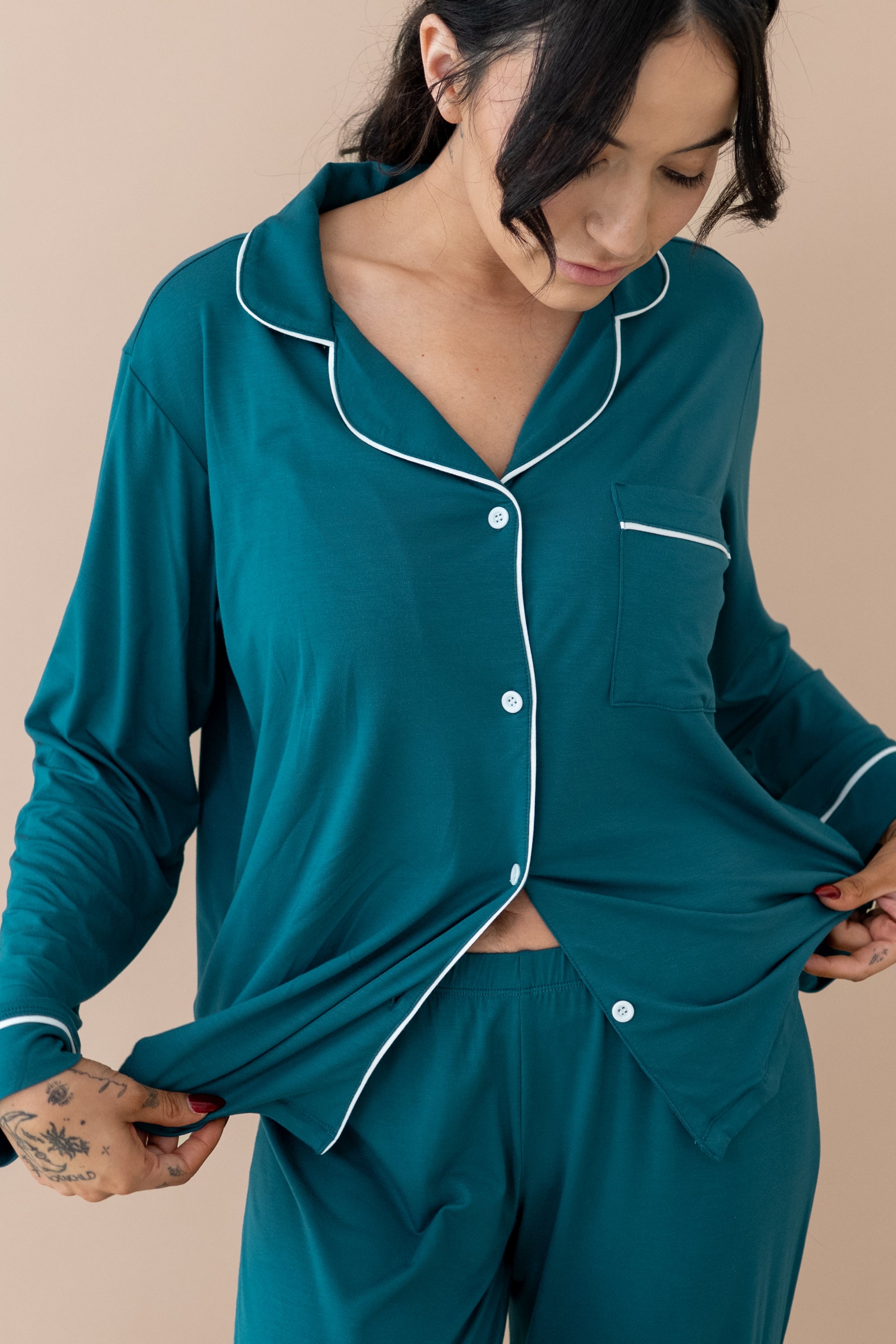 Close up of button closure and fabric om Women's Long Sleeve Pajama Set in Loch with Cloud Trim