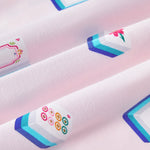 Close up of Mahjong print on Pink Fabric