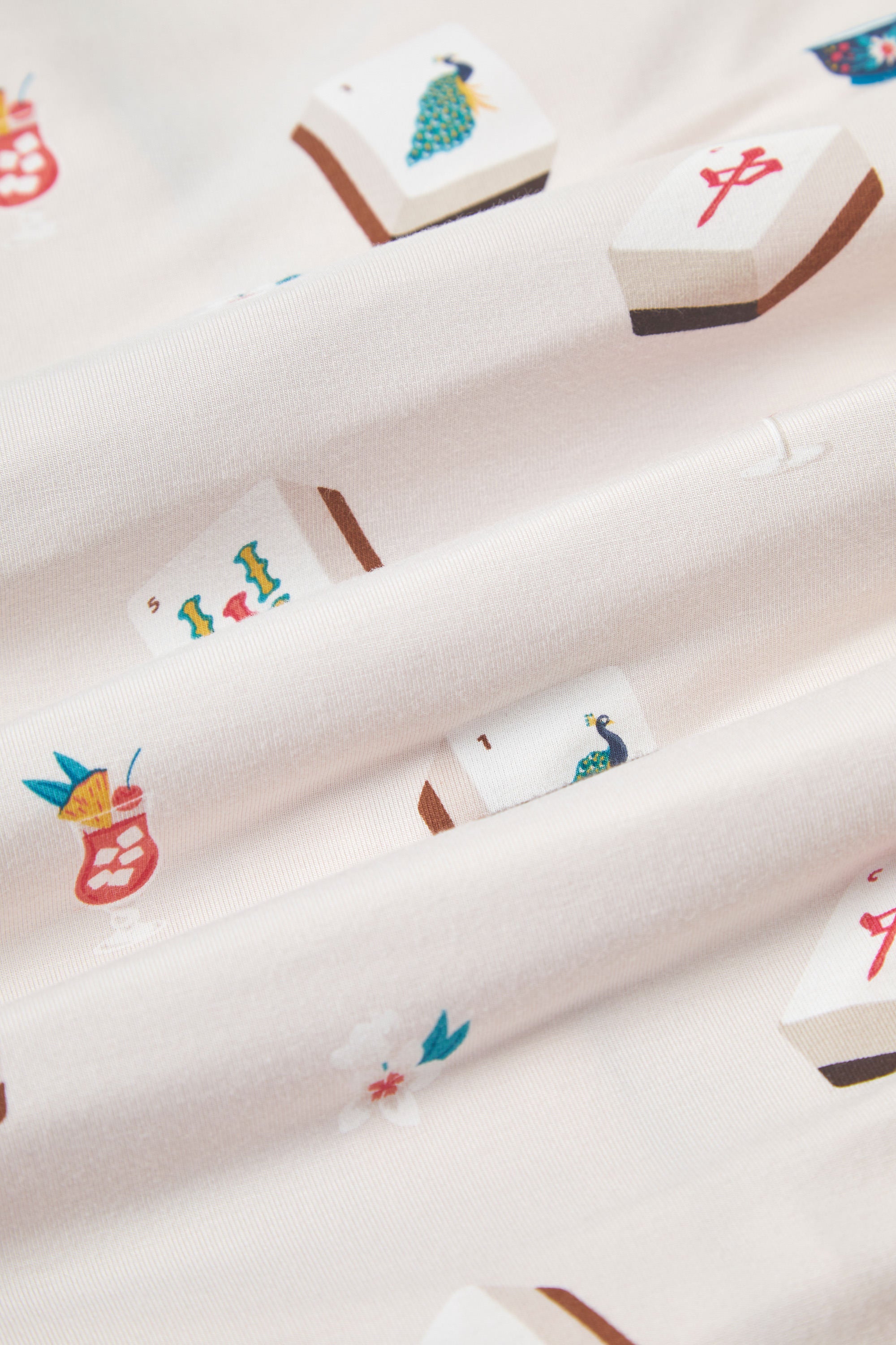 Close up of Vanilla fabric with Mahjong print