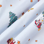 A repeating, all-over print featuring: Mickey Mouse and Minnie Mouse wearing Santa hats and decorating a Christmas tree with presents underneath; Donald Duck carrying a stack of presents away from a Christmas tree; Pluto, eyes closed and wearing a Santa hat, laying down next to a Christmas stocking filled with a bone and a candy cane; Daisy Duck holding a steaming mug; Goofy walking with a stack of presents; three wrapped presents in a stack; and gold stars scattered over a pale blue background color called