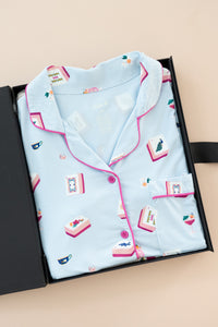 Long-Sleeved Women's Pajama Set in Mahjong print packed in a box on a beige background