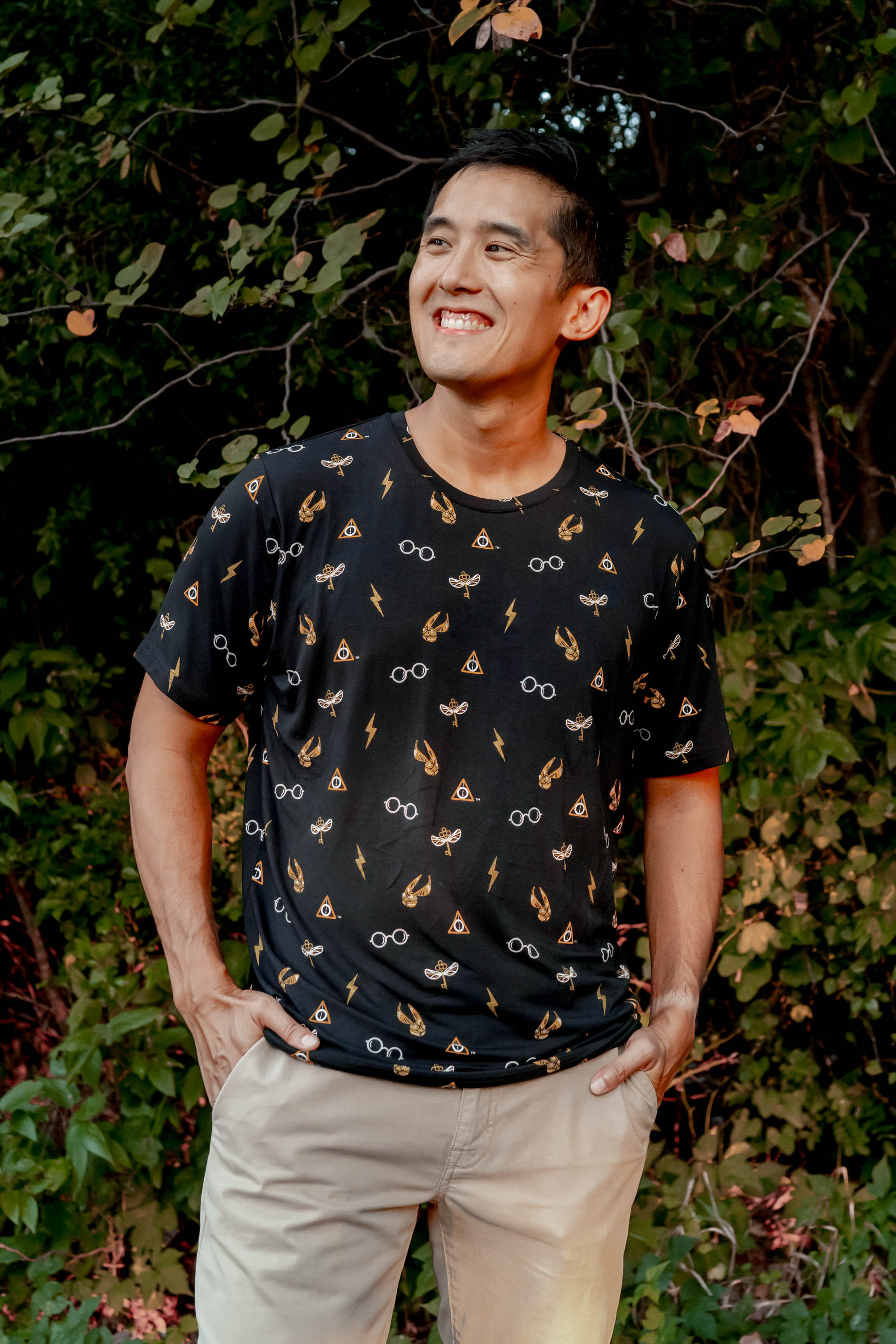 Male model wearing the Men's Crew Neck Tee in Midnight Icon with khaki colored pants