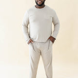 Male model wearing the Men's Jogger Set in Almond with both hands in pockets
