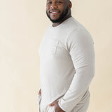 Male model wearing the Men's Jogger Set in Almond with both hands in pants pockets