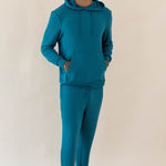 Male wearing the Men's Ribbed Jogger Pant in Loch and Men's Ribbed Hoodie in Loch