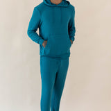Male wearing the Men's Ribbed Jogger Pant in Loch and Men's Ribbed Hoodie in Loch