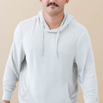 Male model wearing the Men's Ribbed Hoodie in Oat