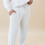 Kyte Baby's Men's Ribbed Jogger Pant in Oat focusing on the drawstring waistband