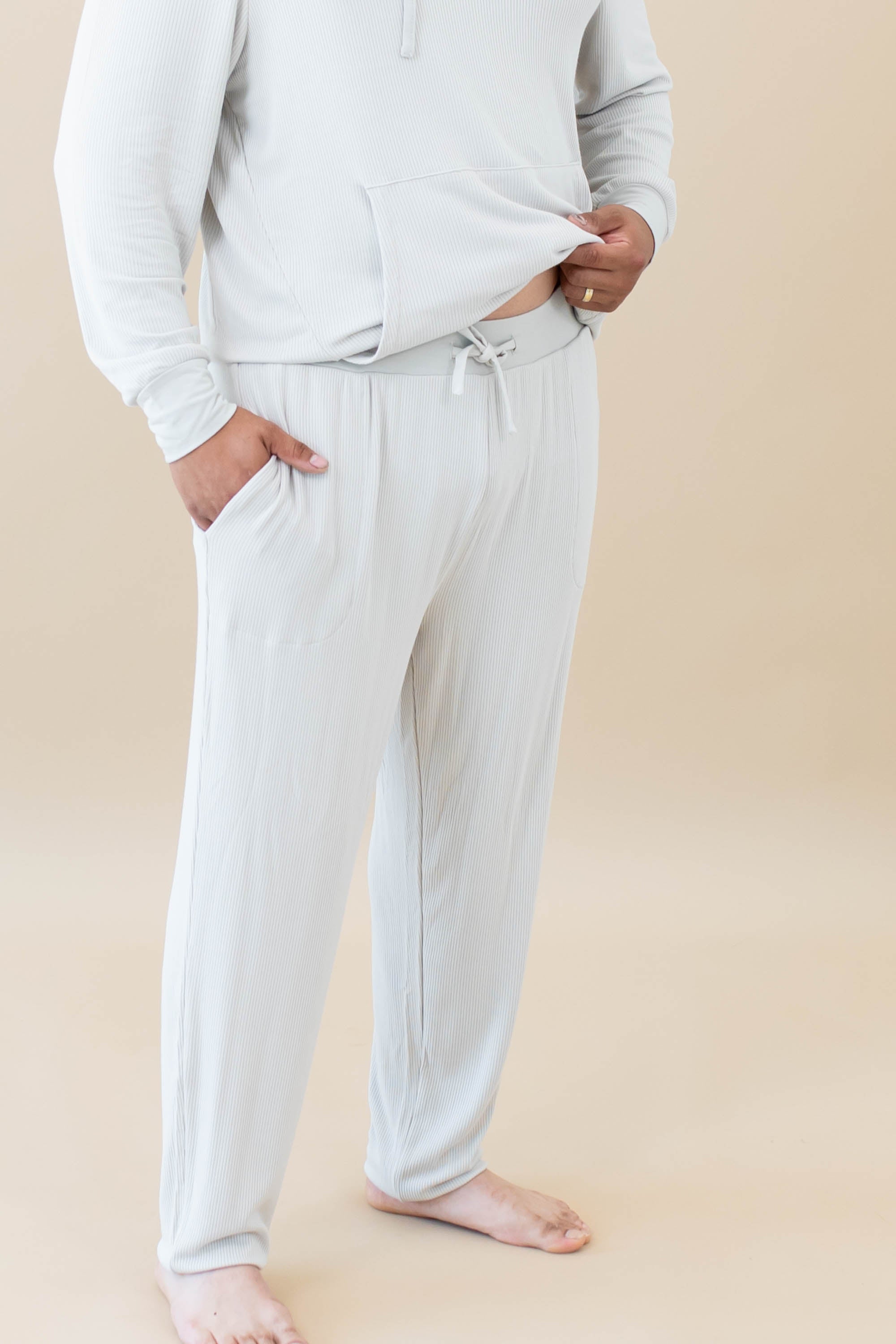 Kyte Baby's Men's Ribbed Jogger Pant in Oat focusing on the drawstring waistband